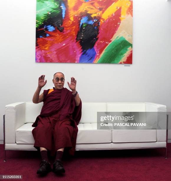 The Dalai Lama, the Tibet's exiled spiritual leader, sits in a sofa in the reception room of the airport of Blagnac, near the French southwestern...