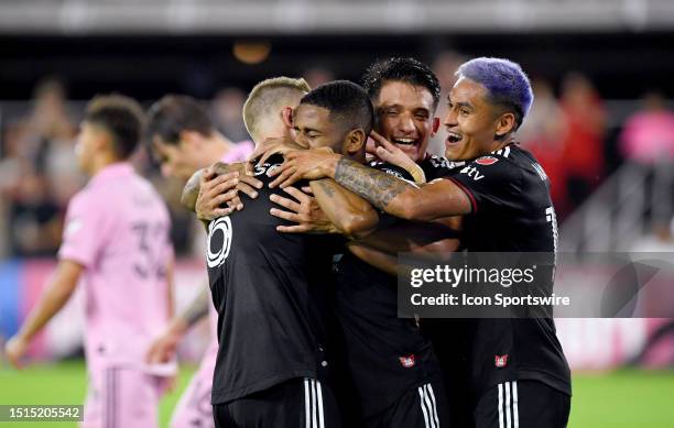United midfielder Russell Canouse , defender Ruan , midfielder Yamil Asad , and defender Andy Najar celebrate after the game-tying goal during the...