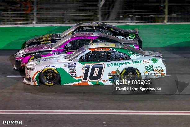 Justin Haley , Kaz Grala , and Kyle Weatherman race three wide during the NASCAR Xfinity Series Alsco 250 at Atlanta Motor Speedway on July 8, 2023...
