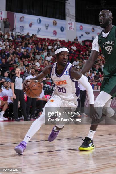 Jawun Evans of the Phoenix Suns drives to the basket during the 2023 NBA Las Vegas Summer League on July 8, 2023 at the Cox Pavilion in Las Vegas,...
