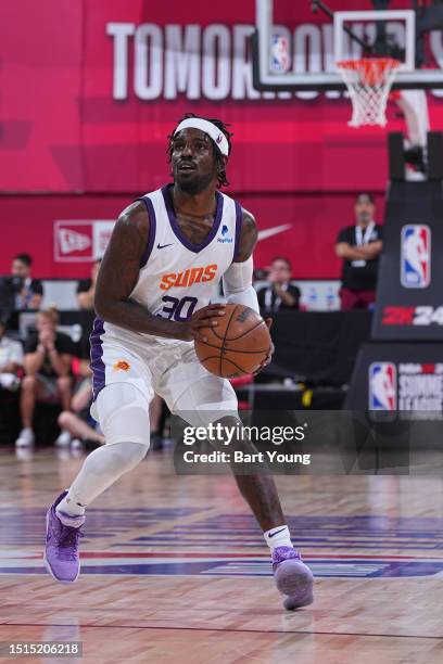 Jawun Evans of the Phoenix Suns handles the ball during the 2023 NBA Las Vegas Summer League on July 8, 2023 at the Cox Pavilion in Las Vegas,...