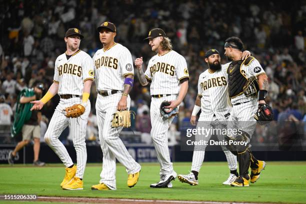 San Diego Padres players walk off the field after the beating the New York Mets 3-1 in a baseball game at Petco Park on July 8, 2023 in San Diego,...
