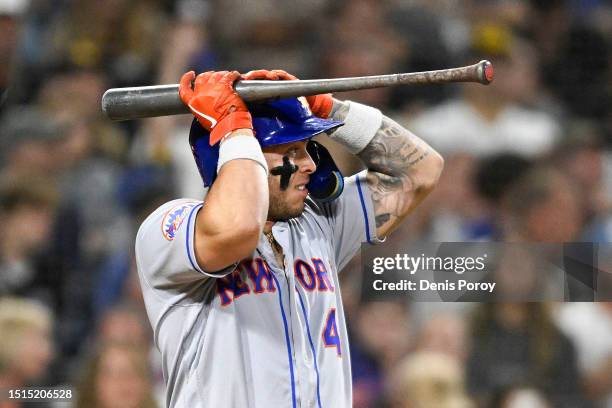 Francisco Alvarez of the New York Mets reacts after taking a strike during the ninth inning of a baseball game against the San Diego Padres at Petco...