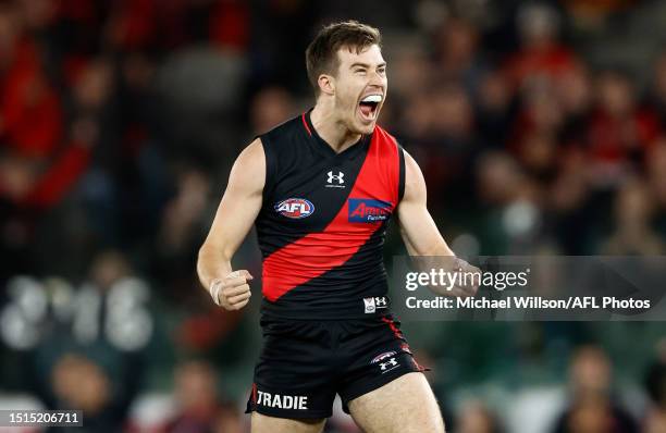 Zach Merrett of the Bombers celebrates a goal during the 2023 AFL Round 17 match between the Essendon Bombers and the Adelaide Crows at Marvel...