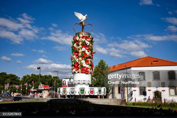 Huge Tabuleiro is built in the middle of a roundabout for the Festa dos Tabuleiros in Tomar, Portugal on July 8, 2023.