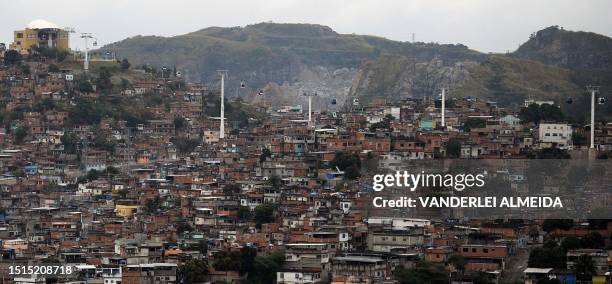 View of the Morro do Alemao shantytown complex after the inauguration of the Bonsucesso-Morro do Alemao cable railway line, in Rio de Janeiro,...