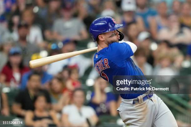 Nico Hoerner of the Chicago Cubs hits the game-winning RBI single against the Milwaukee Brewers in the top of the 11th at American Family Field on...