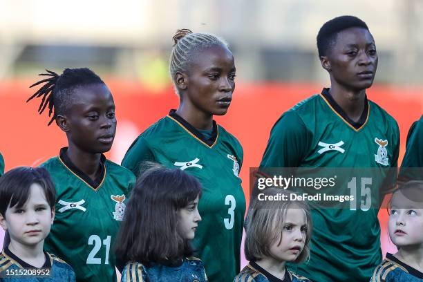 Evarine Katongo of Zambia, Lushomo Mweemba of Zambia and Agness Musesa of Zambia look on prior to the Women's international friendly between Germany...