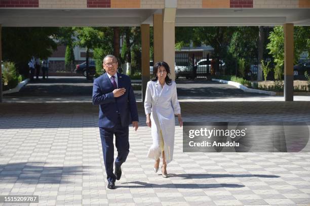 Ulughbek Inoyatov member of the People's Democratic Party arrives to cast his vote at a polling station during the early presidential election in...