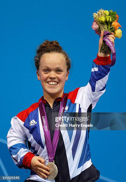 Silver medallist Eleanor Simmonds of Great Britain poses on the podium during the medal ceremony for the Women's 100m Freestyle - S6 final on day 10...