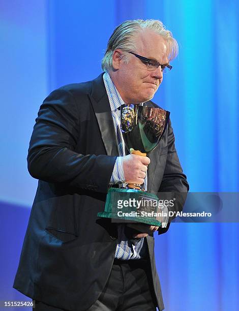 Philip Seymour Hoffman receieves the Coppa Volpi award for best actor during the Award Ceremony during The 69th Venice Film Festival at the Palazzo...