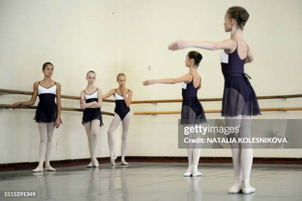 Young students of the Bolshoi Ballet Academy attends a class in their school in Moscow, on October 18, 2011. Some of the academy students will take...