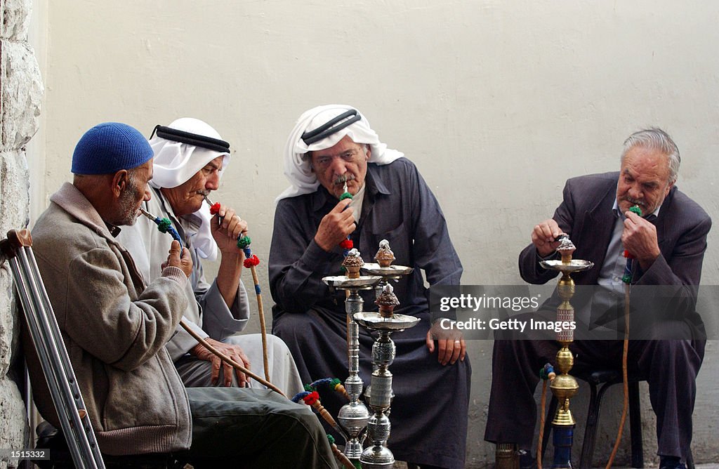 Jordanian Men Sit In A Cafe