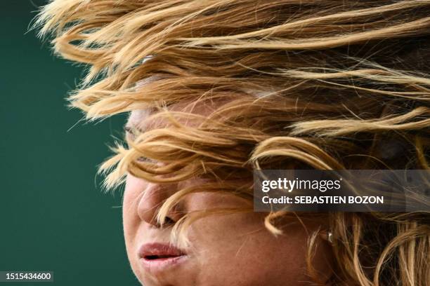 Czech Republic's Marie Bouzkova returns the ball to Czech Republic's Marketa Vondrousova during their women's singles tennis match on the seventh day...