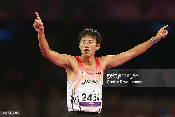 Toru Suzuki of Japan celebrates as successful attempt in the Men's High Jump F46 Final on day 10 of the London 2012 Paralympic Games at Olympic...