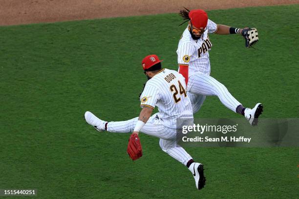 Rougned Odor and Fernando Tatis Jr. #23 of the San Diego Padres celebrate after defeating the Los Angeles Angels 8-5 during in a game at PETCO Park...