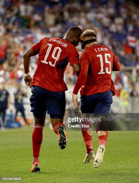 Kendall Waston of Costa Rica celebrates his goal with teammate Francisco Calvo during the first half of the Group C match against Martinique during...