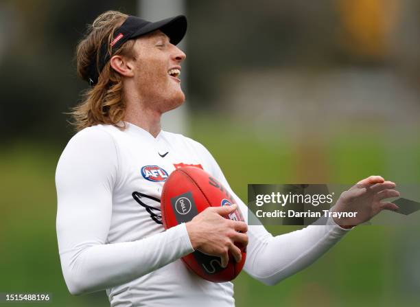 Nathan Murphy of the Magpies looks on during a Collingwood Magpies AFL training session at Olympic Park Oval on July 05, 2023 in Melbourne, Australia.