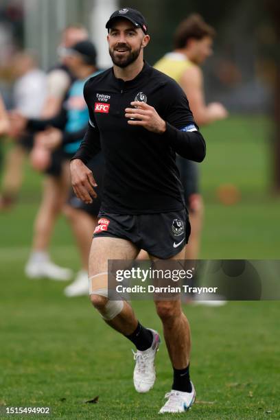 Steele Sidebottom of the Magpies takes part during a Collingwood Magpies AFL training session at Olympic Park Oval on July 05, 2023 in Melbourne,...