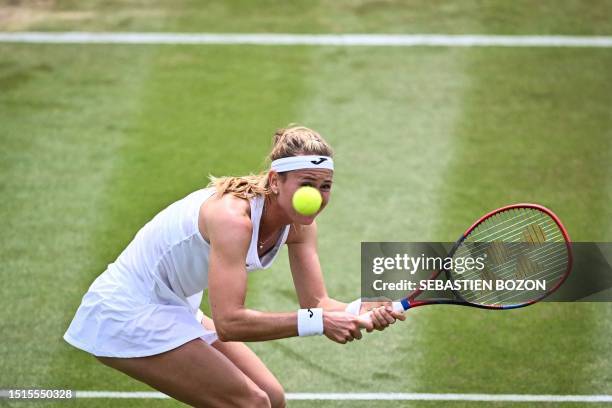 Czech Republic's Marie Bouzkova eyes the ball as she prepares to return it to Czech Republic's Marketa Vondrousova during their women's singles...