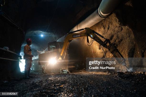 Workers are working at the mining and beneficiating project of Zhugongtang lead and zinc mine in Zinche village, Shuitangbao Township, Hezhang...