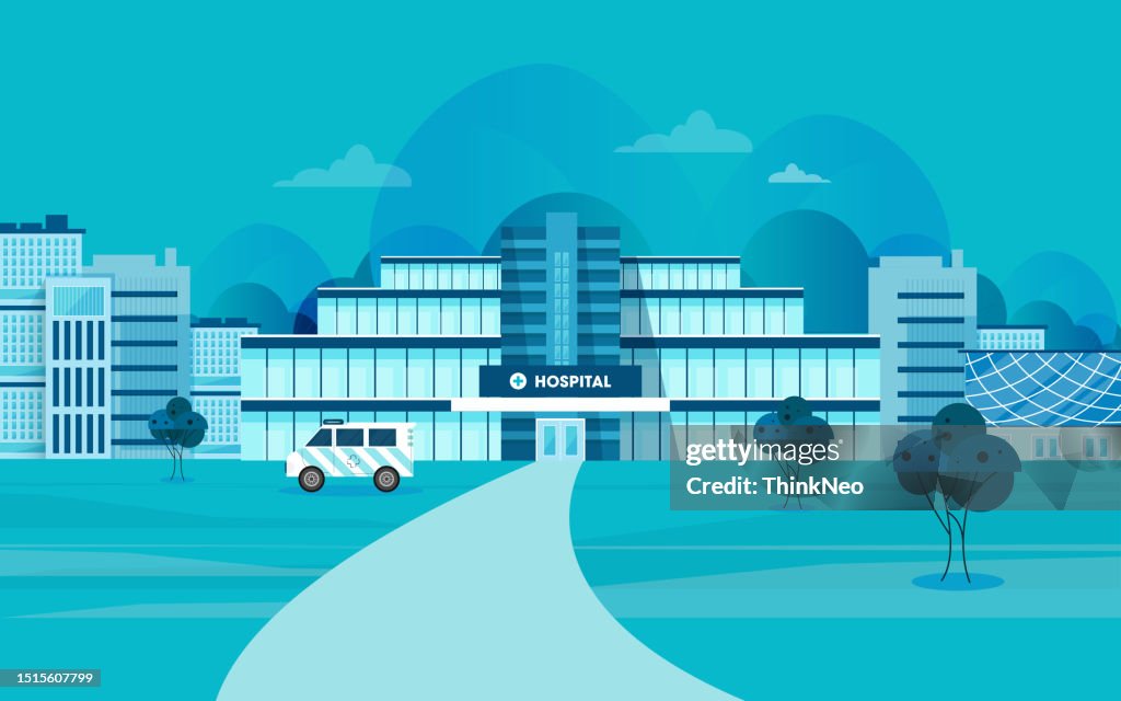 Health center, exterior of hospital building. Ambulance