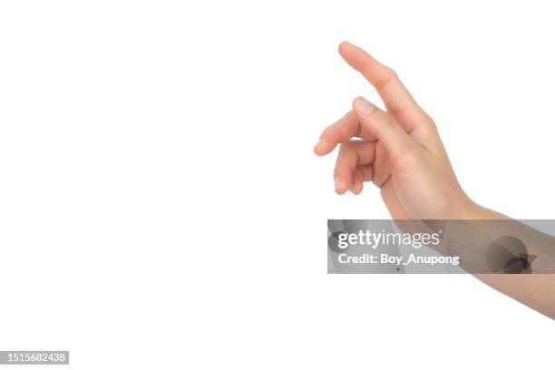 cropped shot of woman hand trying to touching something isolated with white background. - hand pointing ストックフォトと画像