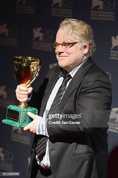 Actor Philip Seymour Hoffman of "The Master" with the Coppa Volpi Award for "Best Actor" during the Award Winners Photocall during The 69th Venice...