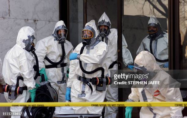 Hazardous materials experts enter the Hart Building of the US Senate 07 November 2001 in Washington, DC. The Hart Building has been closed after an...