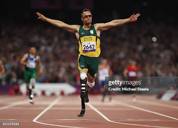 Oscar Pistorius of South Africa celebrates as he wins gold in the Men's 400m T44 Final on day 10 of the London 2012 Paralympic Games at Olympic...