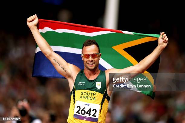 Oscar Pistorius of South Africa celebrates as he wins gold in the Men's 400m T44 Final on day 10 of the London 2012 Paralympic Games at Olympic...