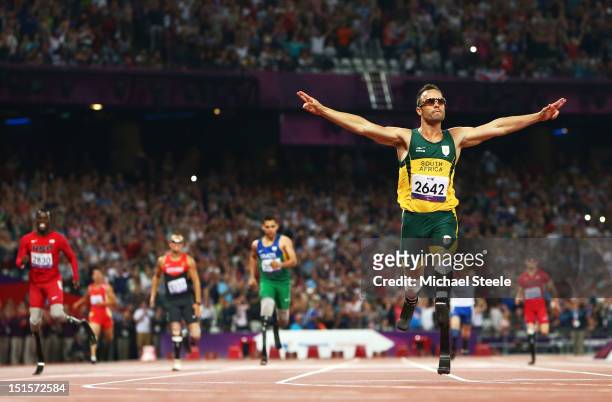 Oscar Pistorius of South Africa celebrates as he wins gold in the Men's 400m T44 Final on day 10 of the London 2012 Paralympic Games at Olympic...
