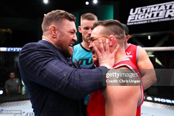 Conor McGregor pushes Michael Chandler during the filming of The Ultimate Fighter at UFC APEX on March 03, 2023 in Las Vegas, Nevada.