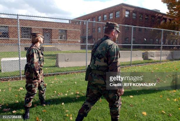 Members of the Michigan National Guard patrol outside of the BioPort Corpation plant in Lansing, Michigan 15 October 2001. BioPort is the only...