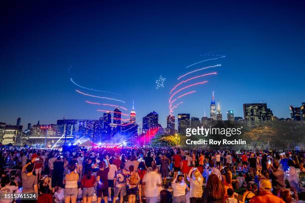 Drones perform a light show before the Macy's fireworks display celebrating the United States 247th independence day on July 04, 2023 in New York...