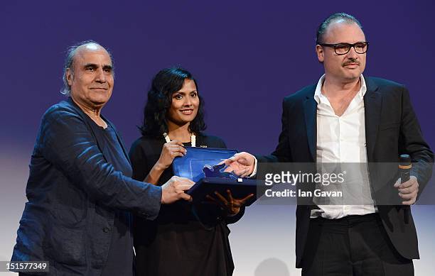 Director Frederic Fonteyne receives the Special Orizzonti Jury Prize award for Full-Length Films for the film Tango Libre from Amir Naderi and Runa...