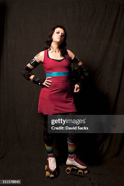 portrait of woman in skates - roller derby foto e immagini stock