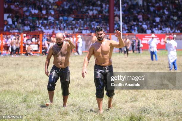 Wrestlers compete during the 662nd Kirkpinar Oil Wrestling Festival at the Sarayici field in Edirne, Turkiye on July 09, 2023.