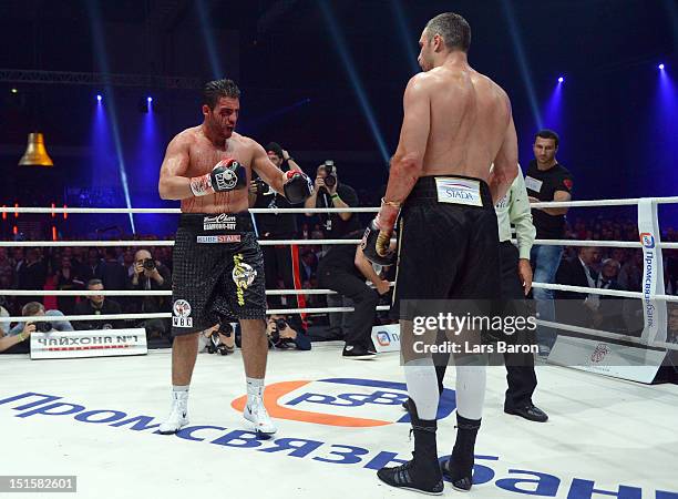 Manuel Charr of Germany argues with Vitali Klitschko of Ukraine after loosing the WBC-heavy weight title fight between Vitali Klitschko of Ukraine...