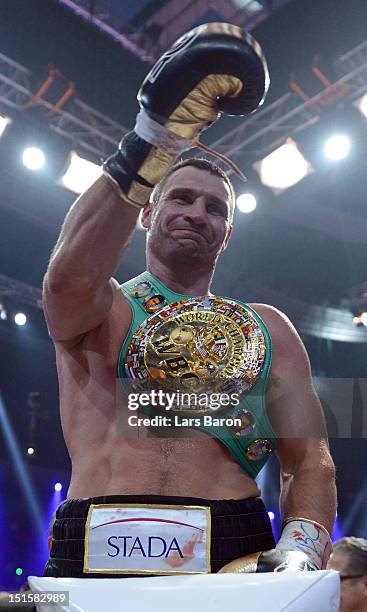 Vitali Klitschko of the Ukraine celebrates after winning the WBC-heavy weight title fight between Vitali Klitschko of Ukraine and Manuel Charr of...
