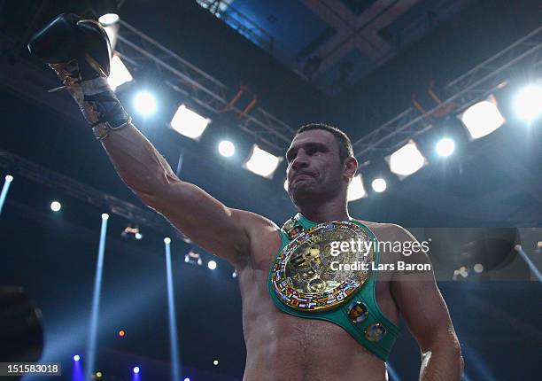 Vitali Klitschko of the Ukraine celebrates after winning the WBC-heavy weight title fight between Vitali Klitschko of Ukraine and Manuel Charr of...