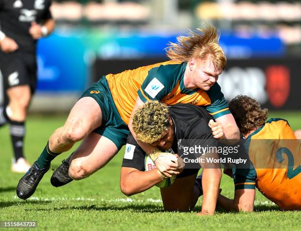 Siale Lauaki of New Zealand U20 tackled by Nick Bloomfield of Australia U20 during the World Rugby U20 Championship 2023, 5th Place semi final match...