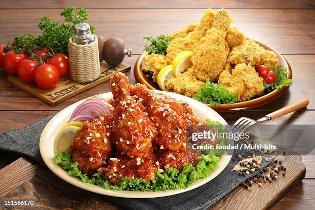 assorted fried chickens - korean fried chicken stock pictures, royalty-free photos & images