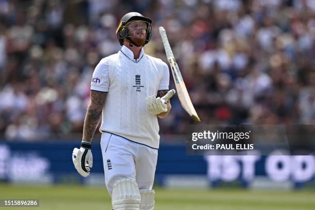 England's captain Ben Stokes reacts as he walks back to the pavilion after losing his wicket for 13 runs on day four of the third Ashes cricket Test...