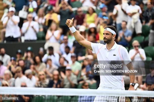 Bulgaria's Grigor Dimitrov celebrates winning against US player Frances Tiafoe during their men's singles tennis match on the seventh day of the 2023...