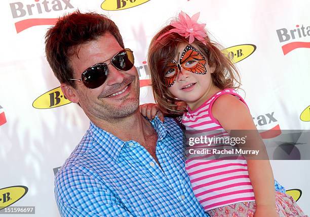 Actor Mark Deklin and daughter Kylie Deklin attend the Red CARpet event hosted by Britax and Ali Landry at SLS Hotel on September 8, 2012 in Beverly...