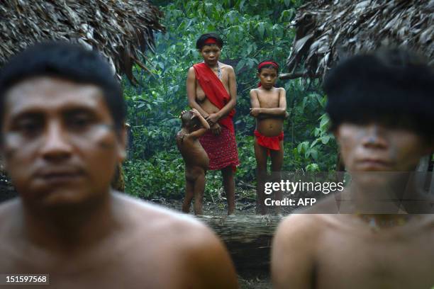 Yanomami natives remain at Irotatheri community, in Amazonas state, southern Venezuela, 19 km away from the border with Brazil, on September 7, 2012....