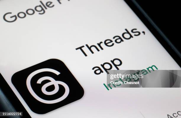 In this photo illustration, the logo of the social media application Threads is displayed on the screen of an iPhone on July 05, 2023 in Paris,...