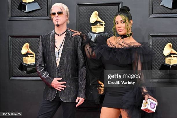 John 5 of Rob Zombie and Rita Lowery at the 64th Annual Grammy Awards held at the MGM Grand Garden Arena on April 3rd, 2022 in Las Vegas, Nevada.