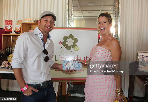 Actor Eric Ladin and wife Katy Ladin attend the Red CARpet event hosted by Britax and Ali Landry at SLS Hotel on September 8, 2012 in Beverly Hills,...